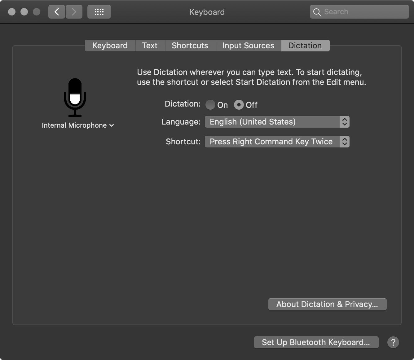 Apple Dictation settings on macOS showing keyboard preferences, language selection, and voice typing controls